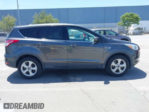 2015 Ford Escape SE with VIN 1FMCU0G78FUC43685, listed as a IAAI auction lot 42189242 with 81,437 mi miles. Bid and sale history available at carsss.com. Image 14.
