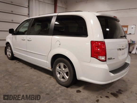 2016 Dodge Grand Caravan R/T with VIN 2C4RDGEG7GR339431, listed as a IAAI auction lot 41988188 with 89,091 mi miles and . Bid and sale history available at DreamBid. Image 3.