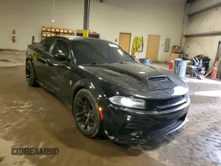 2021 Dodge Charger SRT Hellcat Widebody z VIN 2C3CDXL9XMH617917, wystawiony jako Copart lot #57069205 z przebiegiem 34 859 mil mil oraz Szkoda całkowita • Salvage title. Historia ofert i sprzedaży dostępna na DreamBid. Obrazek 13.