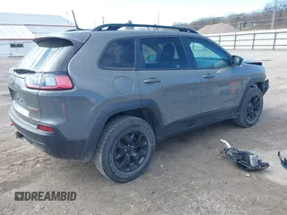2022 Jeep Cherokee Trailhawk with VIN 1C4PJMBX5ND541929, listed as a IAAI auction lot 41815823 with 68,112 mi miles and . Bid and sale history available at DreamBid. Image 4.