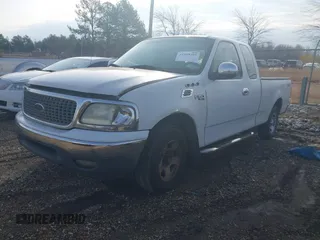 2000 Ford F-150 XL with VIN 1FTZX1729YNC01295, listed as a IAAI auction lot 41298499 with 1 mi miles. Bid and sale history available at carsss.com. Image 2.
