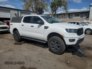 2019 Ford Ranger XL with VIN 1FTER4FH3KLA18820, listed as a Copart auction lot 55341715 with 132,800 mi miles and Salvage title. Bid and sale history available at DreamBid. Image 4.