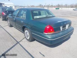 2000 Ford Crown Victoria with VIN 2FAFP73W9YX117108, listed as a IAAI auction lot 41713328 with 83,018 mi miles. Bid and sale history available at carsss.com. Image 3.