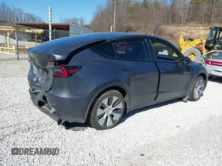 2023 Tesla Model Y Long Range with VIN 7SAYGAEE7PF971620, listed as a IAAI auction lot 41654688 with Not Provided miles and . Bid and sale history available at DreamBid. Image 4.