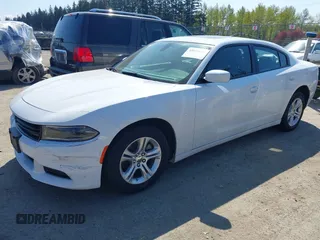 2022 Dodge Charger SXT with VIN 2C3CDXBG4NH197301, listed as a IAAI auction lot 42053688 with 60,592 mi miles and . Bid and sale history available at DreamBid. Image 17.