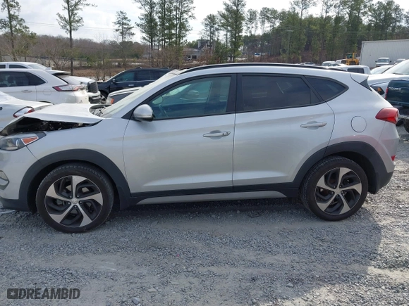 2018 Hyundai Tucson Value with VIN KM8J3CA21JU816783, listed as a IAAI auction lot 41716795 with 84,580 mi miles. Bid and sale history available at carsss.com. Image 14.