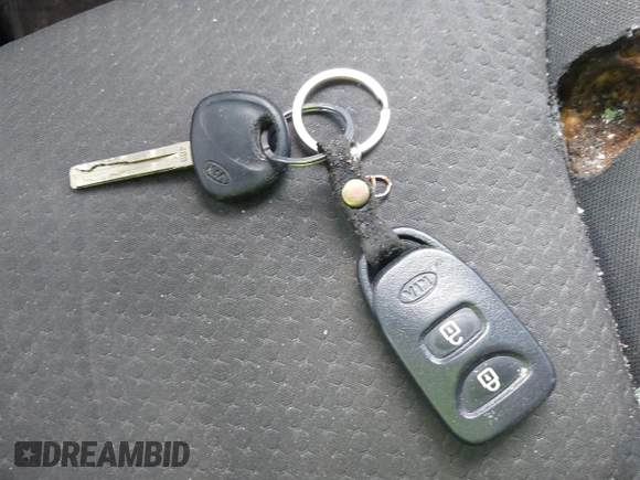2013 Kia Sorento LX with VIN 5XYKT3A1XDG381218, listed as a IAAI auction lot 42511747 with 130,253 mi miles and . Bid and sale history available at DreamBid. Image 11.