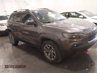 2020 Jeep Cherokee Trailhawk with VIN 1C4PJMBX5LD527462, listed as a IAAI auction lot 41759126 with 63,478 mi miles and . Bid and sale history available at DreamBid. Image 1.