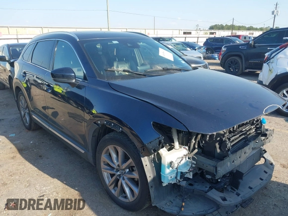 2020 Mazda CX-9 Grand Touring with VIN JM3TCADY0L0422548, listed as a IAAI auction lot 41839601 with 116,952 mi miles and . Bid and sale history available at DreamBid. Image 1.