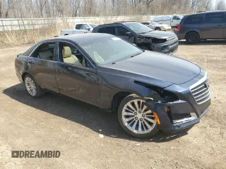 2019 Cadillac CTS Luxury AWD z VIN 1G6AX5SS1K0101825, wystawiony jako Copart lot #52970115 z przebiegiem 56 886 mil mil oraz Czysty tytuł • Clean title. Historia ofert i sprzedaży dostępna na DreamBid. Obrazek 4.
