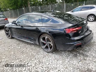 2023 Audi RS 5 Sportback z VIN WUAAWCF5XPA900600, wystawiony jako Copart lot #58295863 z przebiegiem 4808 mil mil oraz . Historia ofert i sprzedaży dostępna na DreamBid. Obrazek 2.