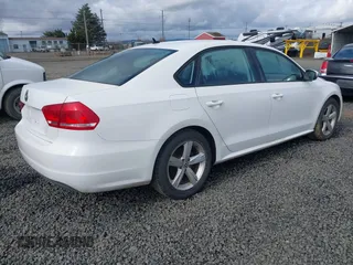 2013 Volkswagen Passat Wolfsburg Edition with VIN 1VWAP7A39DC132046, listed as a IAAI auction lot 41829115 with 122,660 mi miles. Bid and sale history available at carsss.com. Image 4.