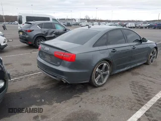 2015 Audi A6 3.0L TDI Prestige with VIN WAUHMAFC9FN036678, listed as a IAAI auction lot 41741472 with 87,932 mi miles. Bid and sale history available at carsss.com. Image 4.