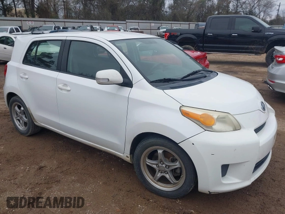 2008 Scion xD with VIN JTKKU104X8J001399, listed as a IAAI auction lot 41638009 with 220,468 mi miles. Bid and sale history available at carsss.com. Image 1.