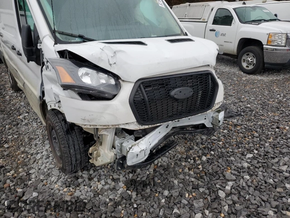2021 Ford Transit Cargo with VIN 1FTBW3X89MKA74340, listed as a Copart auction lot 82188434 with 23,360 mi miles and Salvage Title. Bid and sale history available at carsss.com. Image 9.