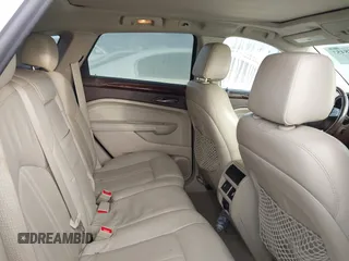 2011 Cadillac SRX Performance Collection with VIN 3GYFNBEY4BS600709, listed as a IAAI auction lot 40858453 with 148,769 mi miles. Bid and sale history available at carsss.com. Image 8.