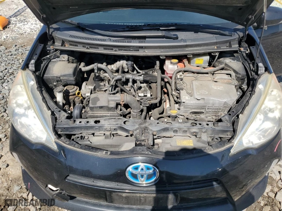 2014 Toyota Prius c One with VIN JTDKDTB39E1562504, listed as a Copart auction lot 52150365 with 195,052 mi miles and Salvage Title. Bid and sale history available at carsss.com. Image 11.