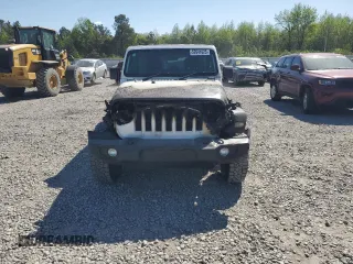 2021 Jeep Wrangler Unlimited Sport with VIN 1C4HJXKN0MW658440, listed as a Copart auction lot 52641025 with Not provided miles and Salvage title. Bid and sale history available at DreamBid. Image 5.