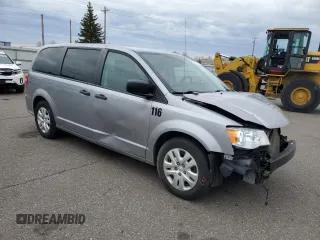 2019 Dodge Grand Caravan SE with VIN 2C4RDGBGXKR642247, listed as a Copart auction lot 54124295 with 153,163 mi miles and Salvage Title. Bid and sale history available at DreamBid. Image 4.