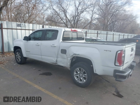 2019 GMC Canyon 4WD SLE z VIN 1GTG6CEN5K1297945, wystawiony jako IAAI lot #41308105 z przebiegiem 93 226 mil mil oraz . Historia ofert i sprzedaży dostępna na DreamBid. Obrazek 3.