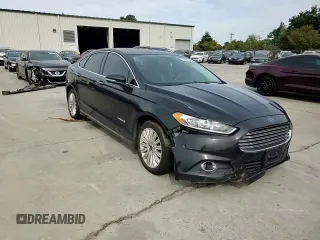 2015 Ford Fusion SE Hybrid with VIN 3FA6P0LU2FR310637, listed as a Copart auction lot 75388924 with 259,077 mi miles and Salvage title. Bid and sale history available at DreamBid. Image 11.