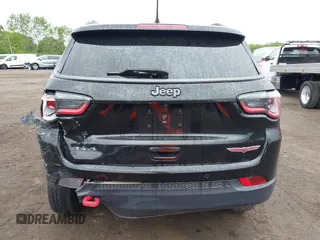 2019 Jeep Compass Trailhawk with VIN 3C4NJDDB7KT727762, listed as a IAAI auction lot 42299260 with 56,733 mi miles and . Bid and sale history available at DreamBid. Image 16.