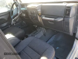 2001 Jeep Wrangler Sport with VIN 1J4FA49S21P346217, listed as a Copart auction lot 46133815 with 103,929 mi miles and Salvage Title. Bid and sale history available at carsss.com. Image 8.