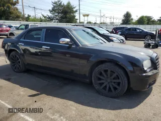2005 Chrysler 300 with VIN 2C3JA63HX5H132776, listed as a Copart auction lot 69312144 with 136,492 mi miles and Salvage Title. Bid and sale history available at carsss.com. Image 4.