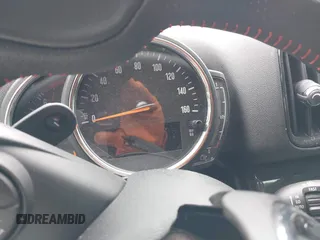 2020 MINI Countryman Cooper S z VIN WMZYX1C09L3L58197, wystawiony jako IAAI lot #42303609 z przebiegiem Nie podano mil oraz . Historia ofert i sprzedaży dostępna na DreamBid. Obrazek 7.