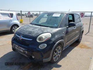 2014 FIAT 500L Trekking with VIN ZFBCFADH4EZ008836, listed as a IAAI auction lot 42305649 with 92,376 mi miles and . Bid and sale history available at DreamBid. Image 2.
