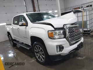 2021 GMC Canyon 4WD Denali with VIN 1GTG6EEN0M1229180, listed as a IAAI auction lot 41298304 with 55,865 mi miles. Bid and sale history available at carsss.com. Image 1.