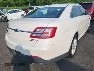 2018 Ford Taurus SEL with VIN 1FAHP2E82JG120034, listed as a IAAI auction lot 42634760 with 71,545 mi miles and . Bid and sale history available at DreamBid. Image 18.
