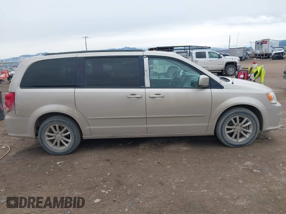 2014 Dodge Grand Caravan SXT z VIN 2C4RDGCG8ER253786, wystawiony jako IAAI lot #41771226 z przebiegiem 175 507 mil mil oraz . Historia ofert i sprzedaży dostępna na DreamBid. Obrazek 13.
