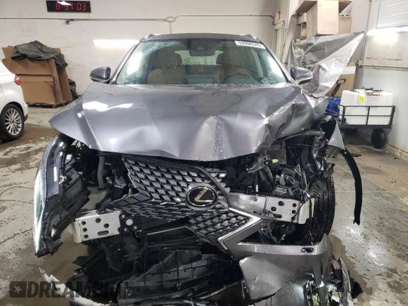 2021 Lexus RX with VIN 2T2HZMDAXMC307489, listed as a Copart auction lot 52098545 with 53,695 mi miles and Salvage Title. Bid and sale history available at carsss.com. Image 5.