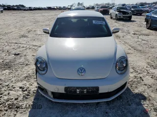 2012 Volkswagen Beetle 2.5L PZEV with VIN 3VWJP7AT6CM622117, listed as a Copart auction lot 48925905 with 86,279 mi miles and Salvage Title. Bid and sale history available at carsss.com. Image 5.