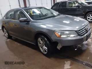 2014 Volkswagen Passat SE z VIN 1VWBN7A37EC079178, wystawiony jako IAAI lot #41873103 z przebiegiem 132 864 mil mil oraz . Historia ofert i sprzedaży dostępna na DreamBid. Obrazek 1.