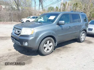2009 Honda Pilot EX-L with VIN 5FNYF48649B018548, listed as a IAAI auction lot 42069029 with 198,098 mi miles and . Bid and sale history available at carsss.com. Image 2.
