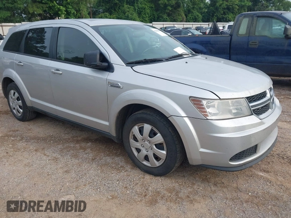 2014 Dodge Journey American Value with VIN 3C4PDCAB5ET198704, listed as a IAAI auction lot 42368950 with 220,615 mi miles and . Bid and sale history available at DreamBid. Image 1.