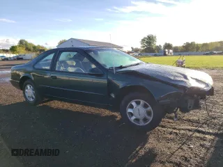 1995 Ford Thunderbird LX z VIN 1FALP6248SH176946, wystawiony jako Copart lot #74066554 z przebiegiem 72 666 mil mil oraz Szkoda całkowita • Salvage title. Historia ofert i sprzedaży dostępna na DreamBid. Obrazek 4.