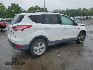 2014 Ford Escape SE with VIN 1FMCU9GX1EUE28700, listed as a Copart auction lot 59841745 with 135,210 mi miles and Salvage title. Bid and sale history available at DreamBid. Image 3.