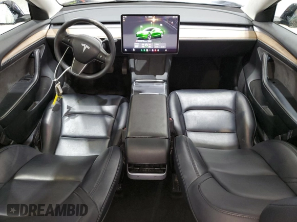 2023 Tesla Model 3 with VIN 5YJ3E1EA4PF452809, listed as a Copart auction lot 63688885 with 125,442 mi miles and Clean title. Bid and sale history available at DreamBid. Image 8.