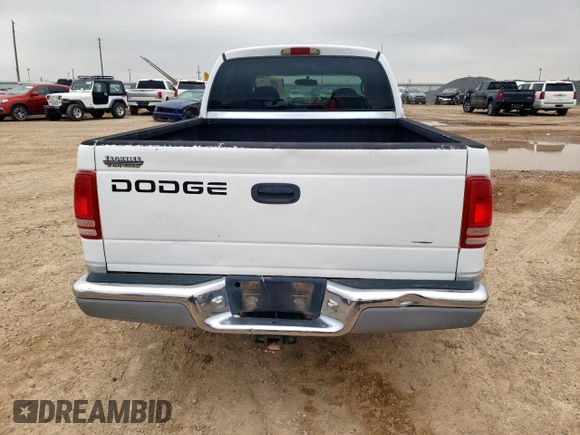 2001 Dodge Dakota Sport z VIN 1B7GL2AN51S118157, wystawiony jako Copart lot #58797325 z przebiegiem 147 765 mil mil oraz Szkoda całkowita • Salvage title. Historia ofert i sprzedaży dostępna na DreamBid. Obrazek 6.