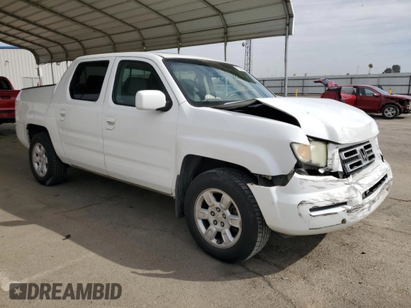 2006 Honda Ridgeline RTL with VIN 2HJYK16506H570523, listed as a Copart auction lot 75746474 with 142,694 mi miles and Salvage Title. Bid and sale history available at carsss.com. Image 4.