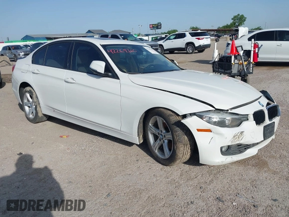 2014 BMW 3 Series 328i with VIN WBA3A5G5XENP32345, listed as a IAAI auction lot 42303835 with 100,235 mi miles and . Bid and sale history available at DreamBid. Image 1.