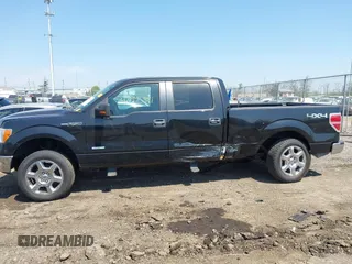 2014 Ford F-150 XL with VIN 1FTFW1ETXEFB51711, listed as a IAAI auction lot 42075381 with 238,603 mi miles. Bid and sale history available at carsss.com. Image 14.