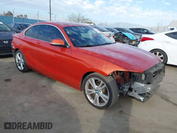 2015 BMW 2 Series 228i with VIN WBA1F9C56FVW98461, listed as a IAAI auction lot 41663193 with 94,584 mi miles. Bid and sale history available at carsss.com. Image 1.