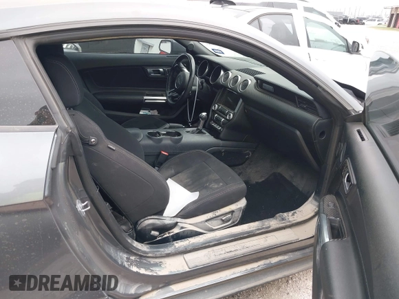2021 Ford Mustang EcoBoost z VIN 1FA6P8TH9M5141038, wystawiony jako IAAI lot #41965588 z przebiegiem 35 344 mil mil oraz . Historia ofert i sprzedaży dostępna na DreamBid. Obrazek 5.