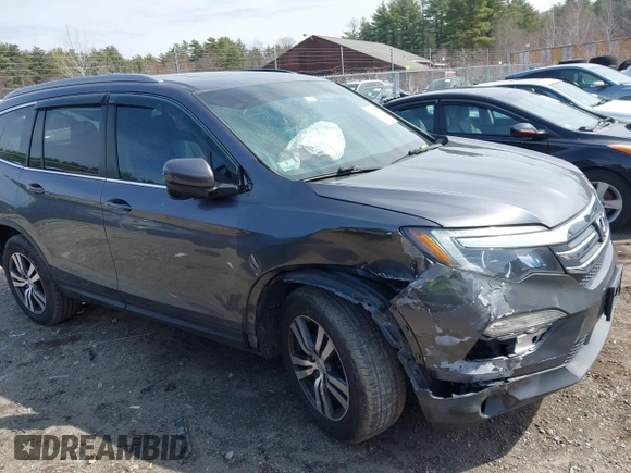2017 Honda Pilot EX-L with VIN 5FNYF6H5XHB009029, listed as a IAAI auction lot 41883366 with 95,711 mi miles and . Bid and sale history available at DreamBid. Image 13.