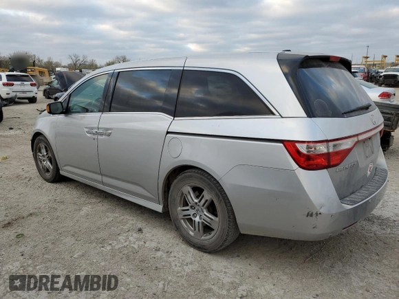 2012 Honda Odyssey Touring with VIN 5FNRL5H93CB114322, listed as a Copart auction lot 50516135 with 300,071 mi miles and Salvage Title. Bid and sale history available at carsss.com. Image 2.