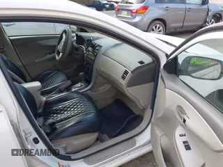 2010 Toyota Corolla with VIN 2T1BU4EE1AC312151, listed as a IAAI auction lot 42761709 with 121,356 mi miles and . Bid and sale history available at DreamBid. Image 5.
